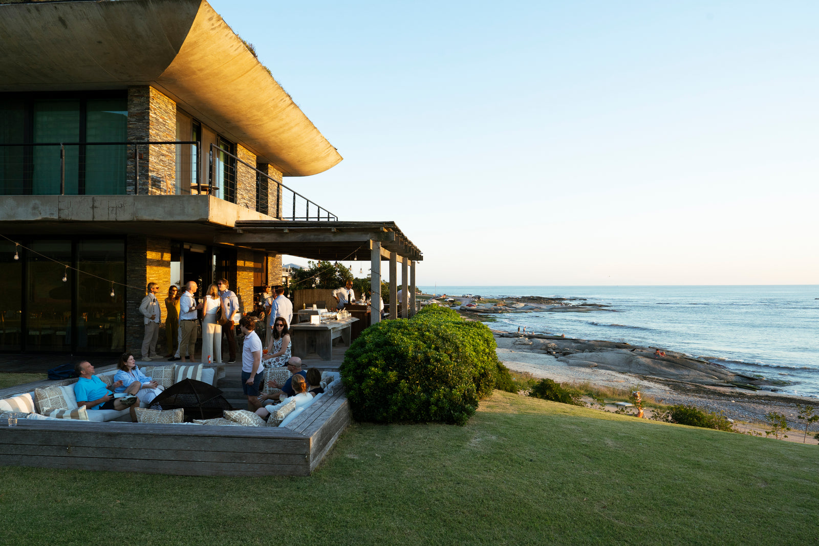 Seaside evening gathering at a private venue